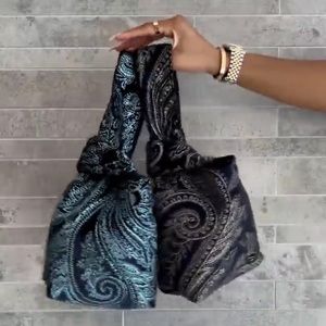 Yaito Glitter Paisley knot bag
